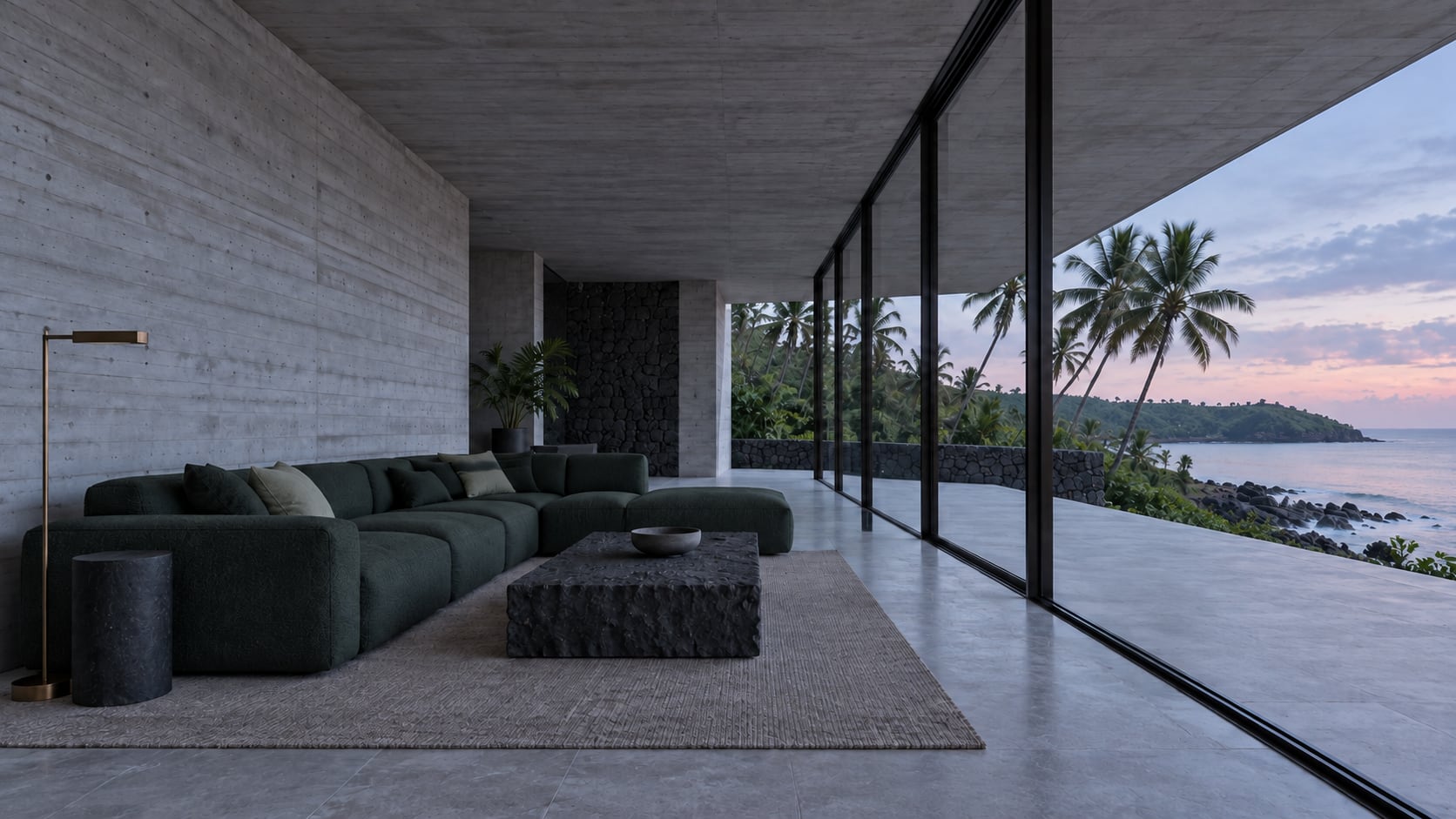 The living room at dawn, 06:15: concrete walls, a pine-green sofa, a basalt table and full-height glass to the sea